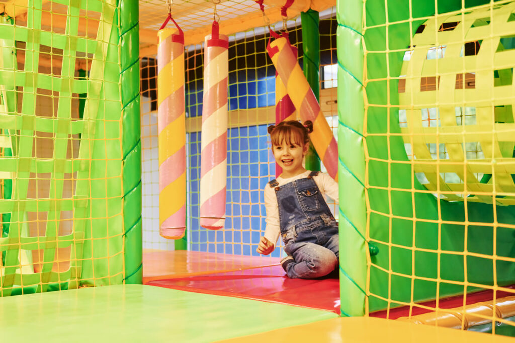 happy little girl casual clothes have fun children s game complex